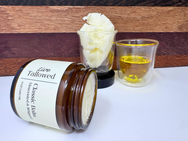 Classic whipped balm amber jar laying down no lid tallow and jojoba ingredients